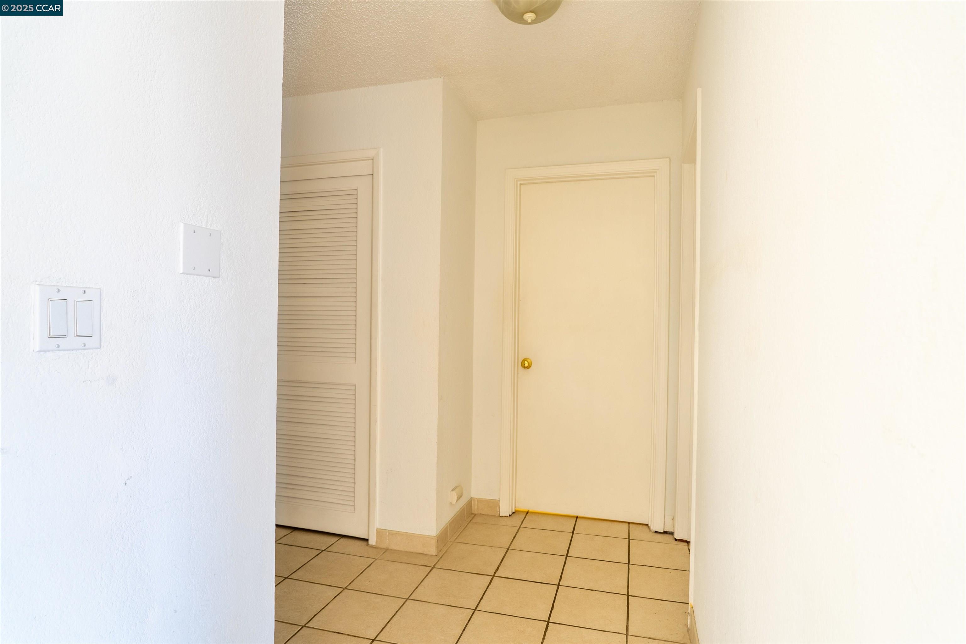 466 Crescent Street, Unit 306 Oakland, CA 94610 - Photo 23 of 26 a view of an empty room