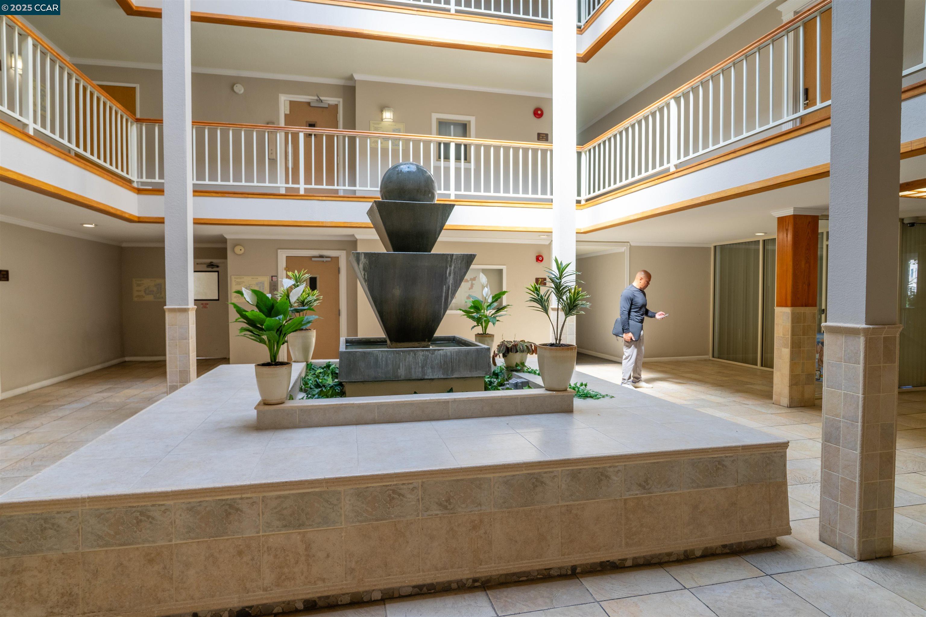 466 Crescent Street, Unit 306 Oakland, CA 94610 - Photo 9 of 26 a living room with furniture