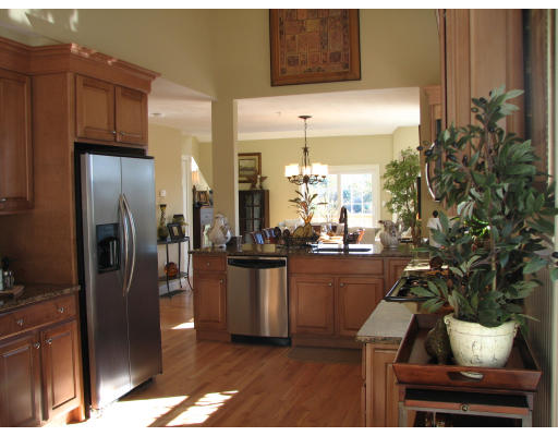 5 A Trail Ridge Way, Unit A Harvard, MA 01451 - Photo 8 of 12 a kitchen with refrigerator and cabinets