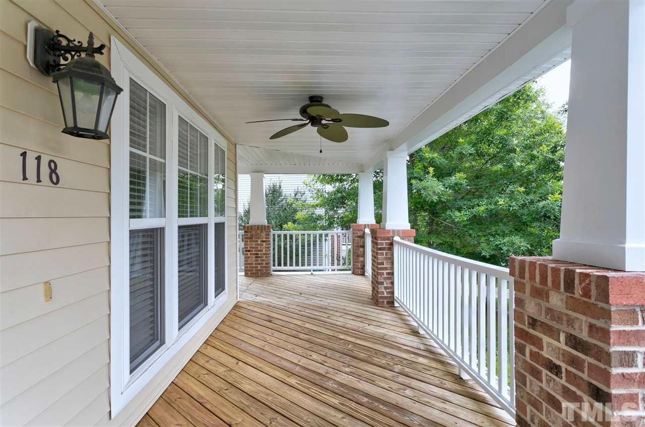118 Key Biscayne Court Raleigh, NC 27603 - Photo 2 of 30 a view of a balcony with wooden floor