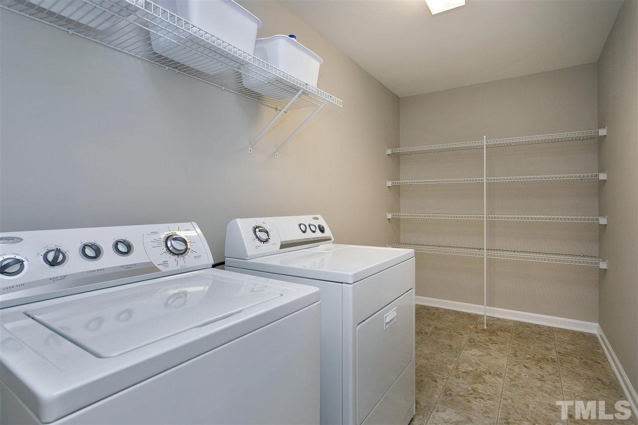 118 Key Biscayne Court Raleigh, NC 27603 - Photo 11 of 30 a utility room with dryer and washer