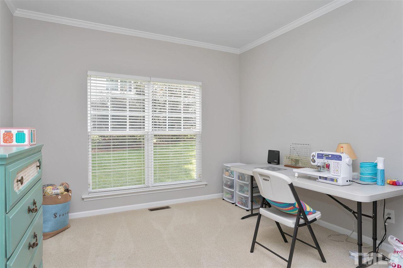 118 Key Biscayne Court Raleigh, NC 27603 - Photo 16 of 30 a workspace with furniture and a window