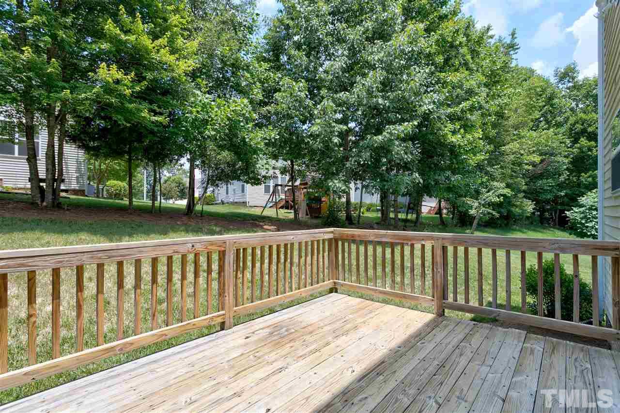 118 Key Biscayne Court Raleigh, NC 27603 - Photo 22 of 30 a view of deck with wooden floor and fence