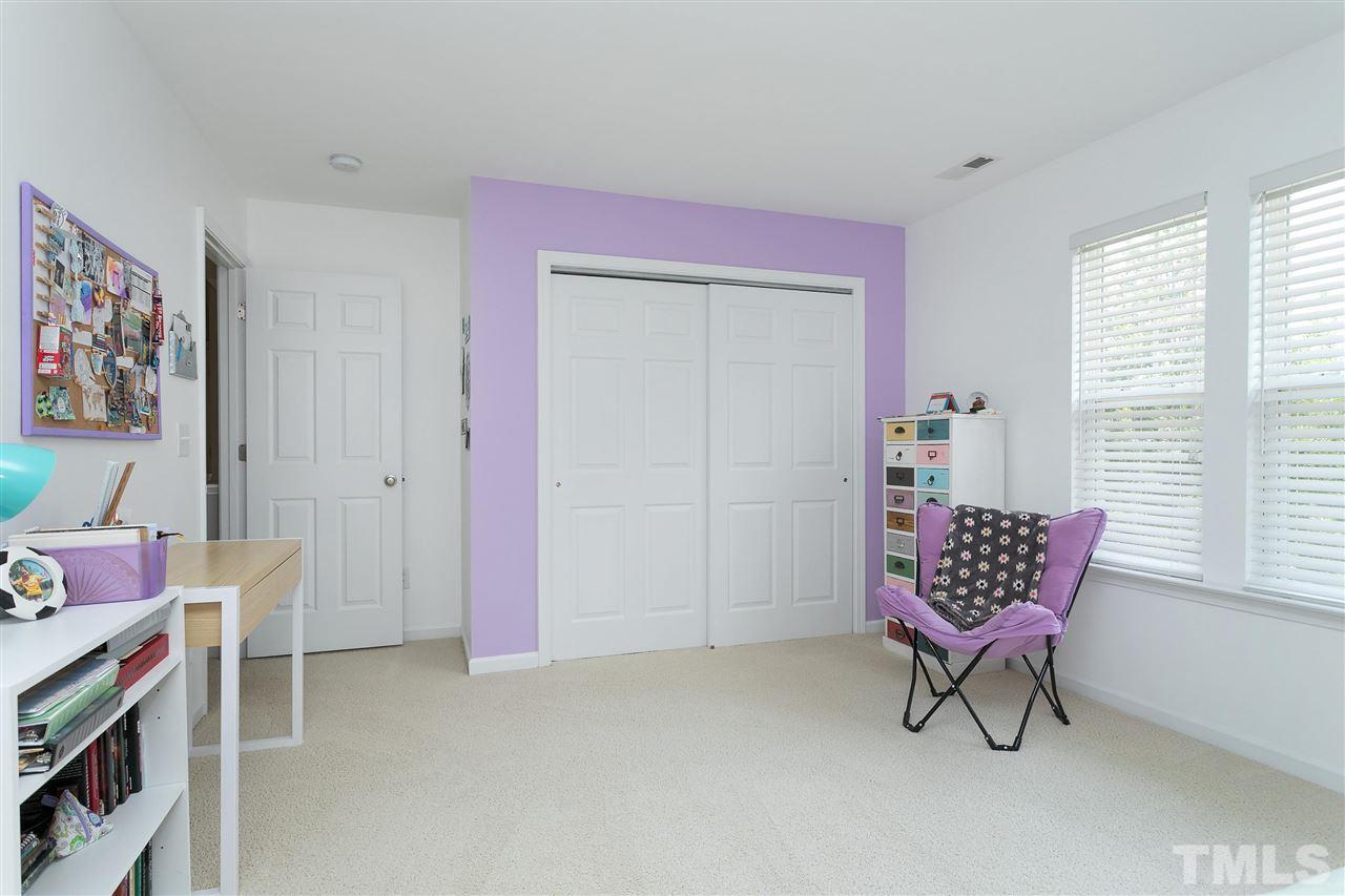 118 Key Biscayne Court Raleigh, NC 27603 - Photo 24 of 30 a living room with furniture and a window