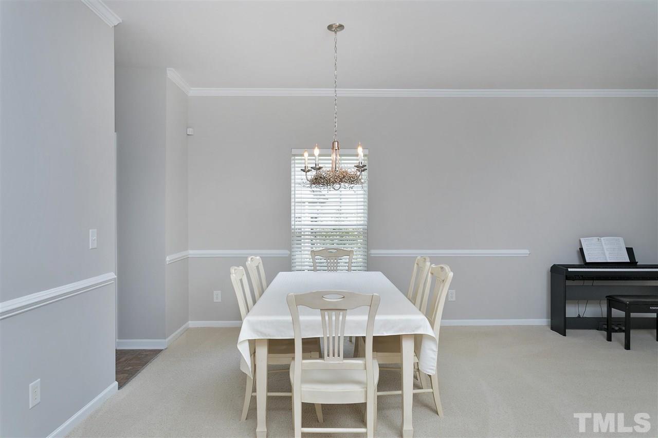 118 Key Biscayne Court Raleigh, NC 27603 - Photo 8 of 30 a view of a dining room with furniture window and outside view