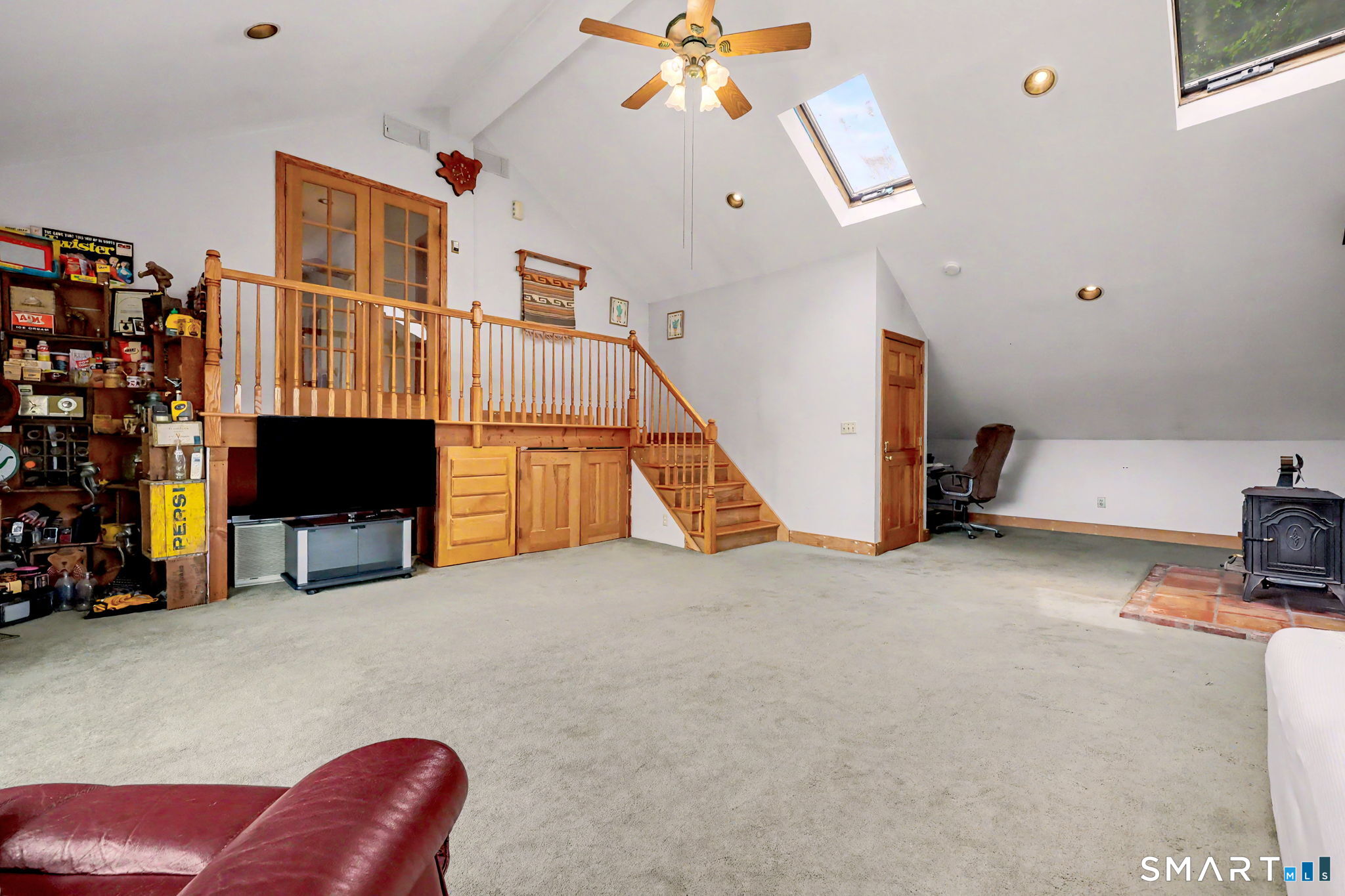 7 Merrill Road Trumbull, CT 06611 - Photo 20 of 40 a view of a livingroom with furniture and staircase