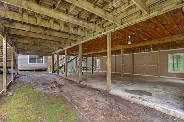a view of a room with wooden walls