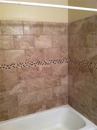 288 Swanson Road, Unit 203 Boxborough, MA 01719 - Photo 2 of 3 a bathroom with a shower
