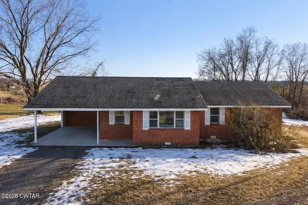 front view of house with a yard