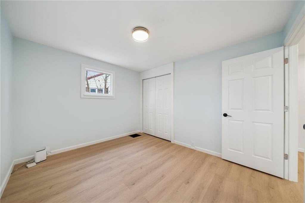 624 6th Street Mather, PA 15346 - Photo 16 of 26 a view of empty room with wooden floor