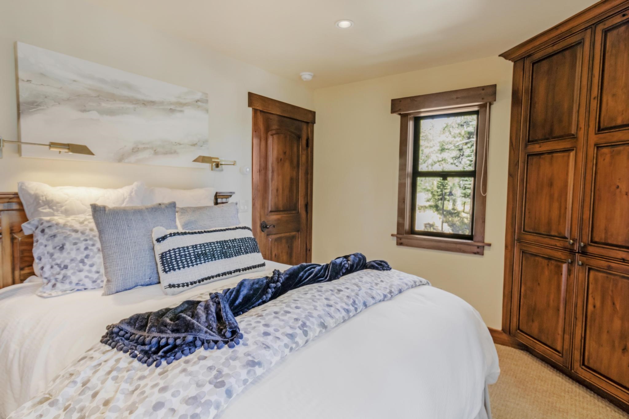 3035 Silver Strike Truckee, CA 96161 - Photo 14 of 20 a bedroom with a bed and wooden floor