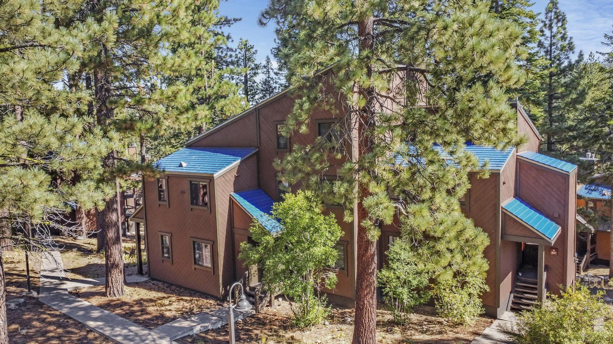 3035 Silver Strike Truckee, CA 96161 - Photo 2 of 20 a house with trees in front of it