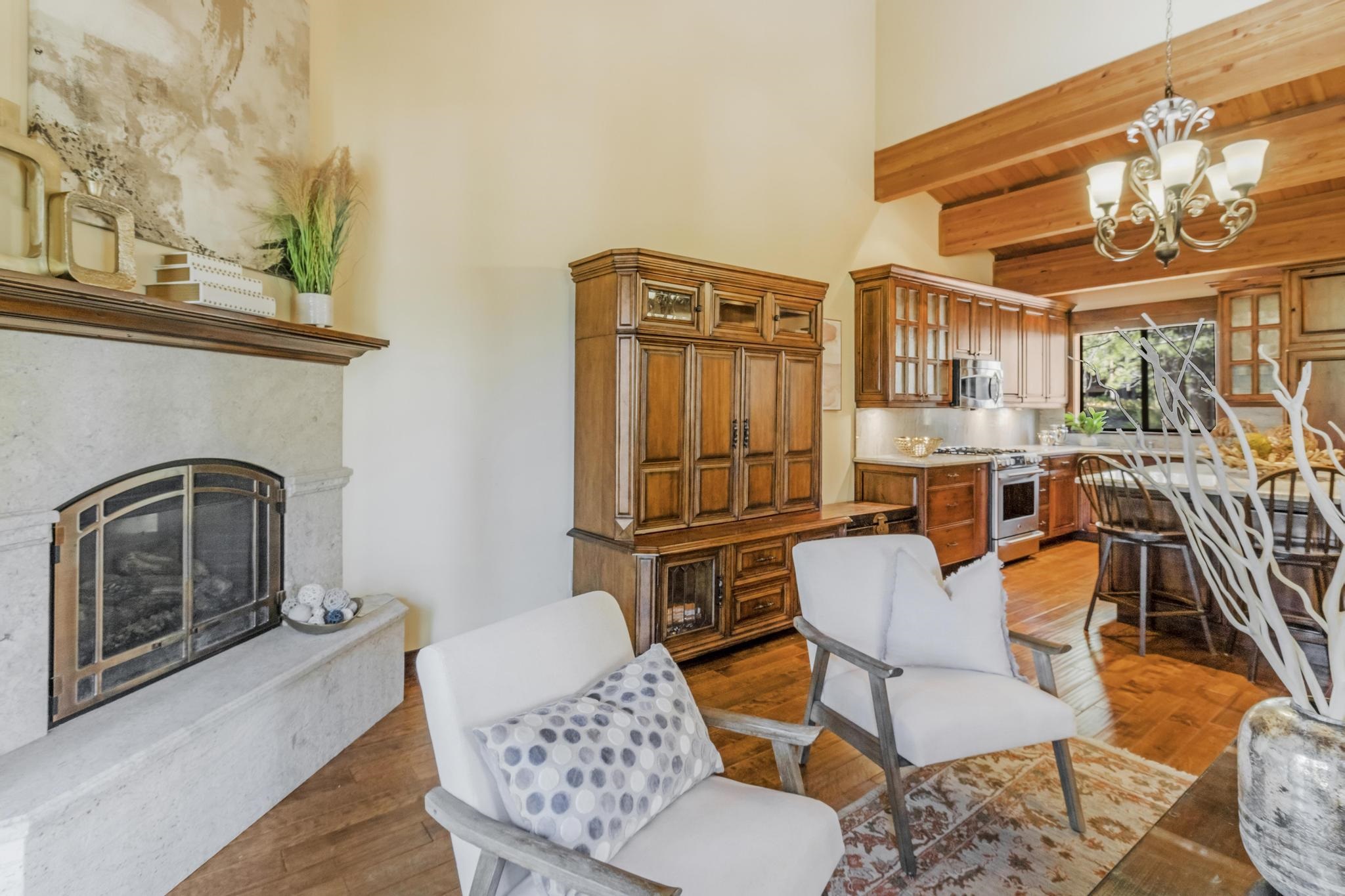 3035 Silver Strike Truckee, CA 96161 - Photo 7 of 20 a living room with furniture a flat screen tv and a fireplace