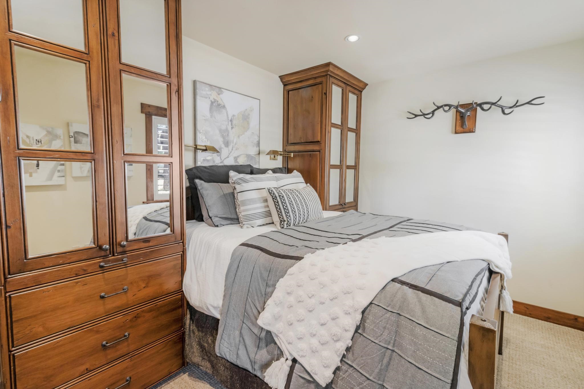 3035 Silver Strike Truckee, CA 96161 - Photo 9 of 20 a bedroom with a bed and wooden floor