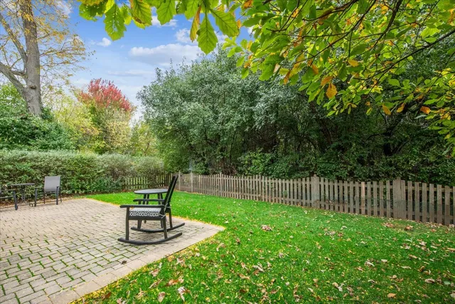 a bench sitting in the middle of a park