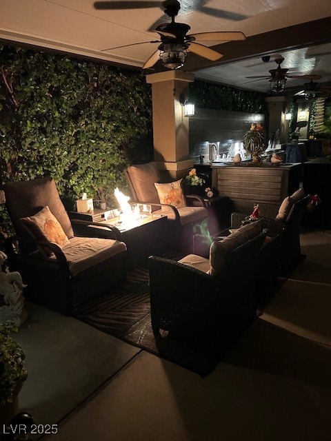 8175 Arville Street, Unit 210 Las Vegas, NV 89139 - Photo 22 of 36 View of patio featuring an outdoor living space with a fire pit and a ceiling fan