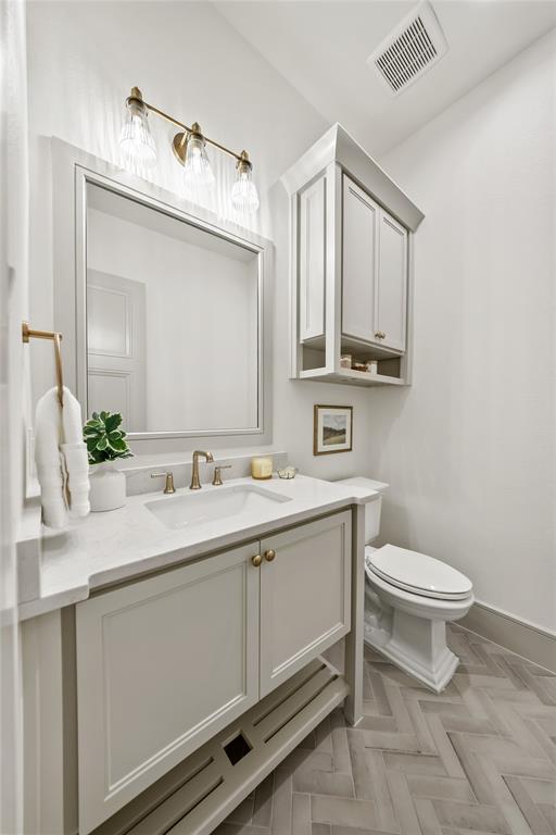 724 Cooper Trail Weatherford, TX 76087 - Photo 19 of 37 Bathroom vanity featuring a white rectangular undermount sink and a light-toned countertop