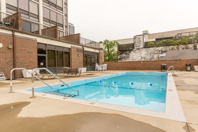 1636 North Wells Street, Unit 1505 Chicago, IL 60614 - Photo 21 of 21 a view of a swimming pool with a lounge chairs