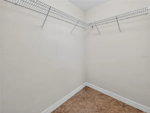 a view of a room with racks on the wall