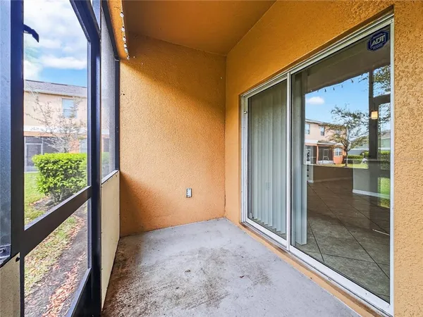 a view of a room with a large window