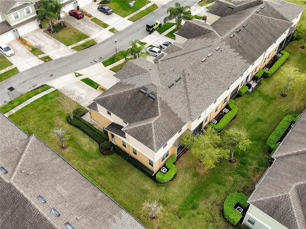an aerial view of a house with garden