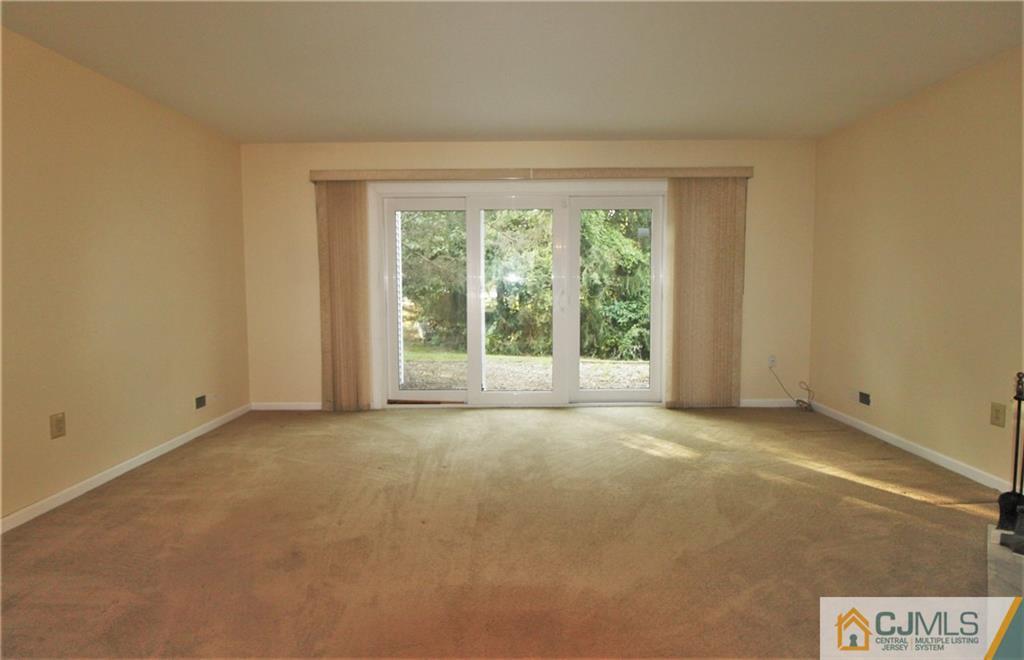 64 Goodwin Drive North Brunswick, NJ 08902 - Photo 12 of 25 a view of an empty room with a window