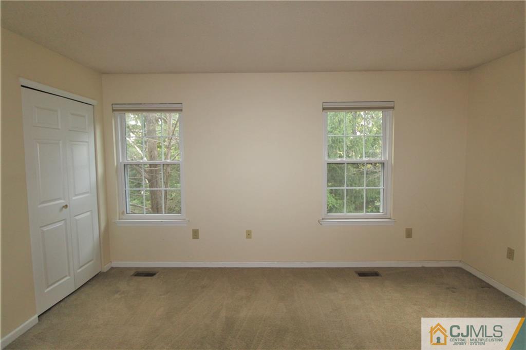 64 Goodwin Drive North Brunswick, NJ 08902 - Photo 14 of 25 an empty room with a window