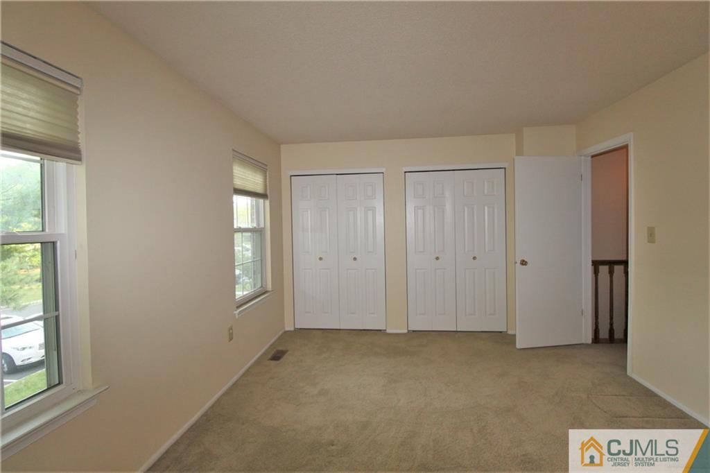 64 Goodwin Drive North Brunswick, NJ 08902 - Photo 19 of 25 a view of an empty room with a window