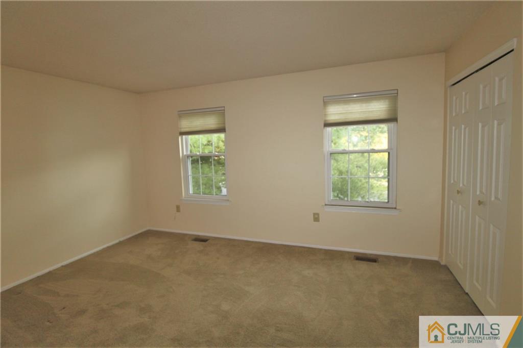 64 Goodwin Drive North Brunswick, NJ 08902 - Photo 20 of 25 an empty room with a window