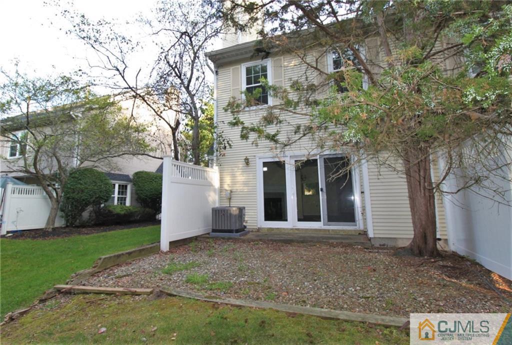 64 Goodwin Drive North Brunswick, NJ 08902 - Photo 24 of 25 front view of a house with a yard