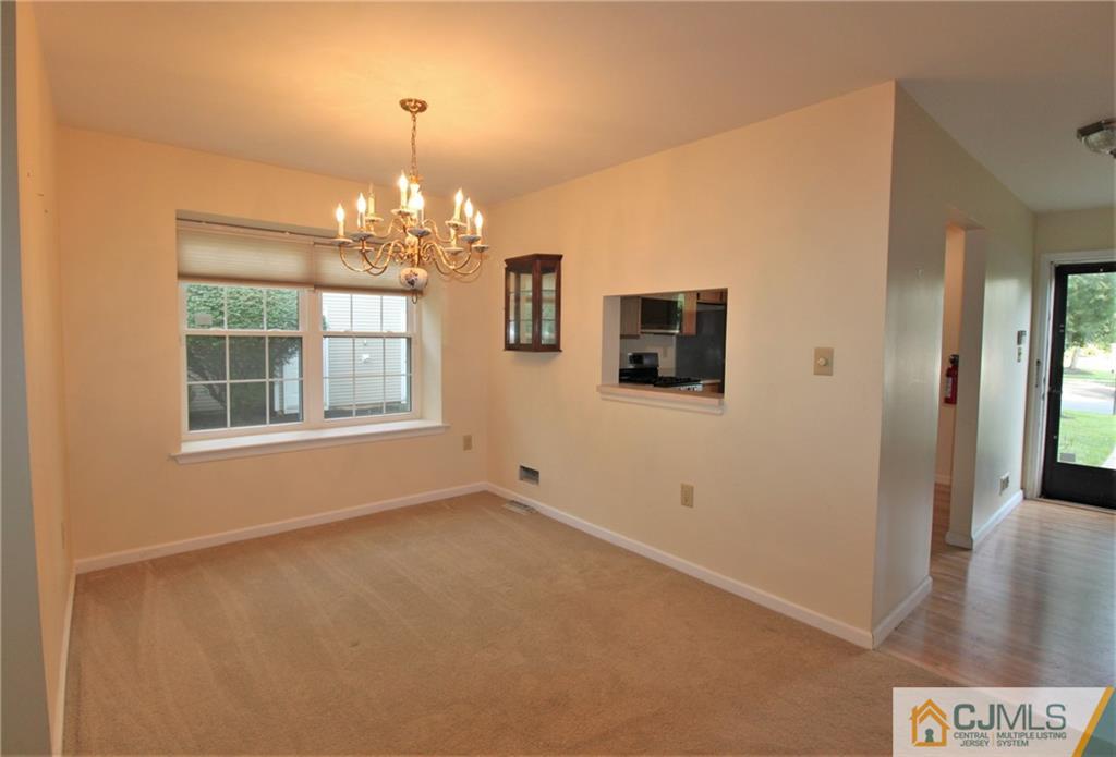 64 Goodwin Drive North Brunswick, NJ 08902 - Photo 7 of 25 a view of livingroom with window
