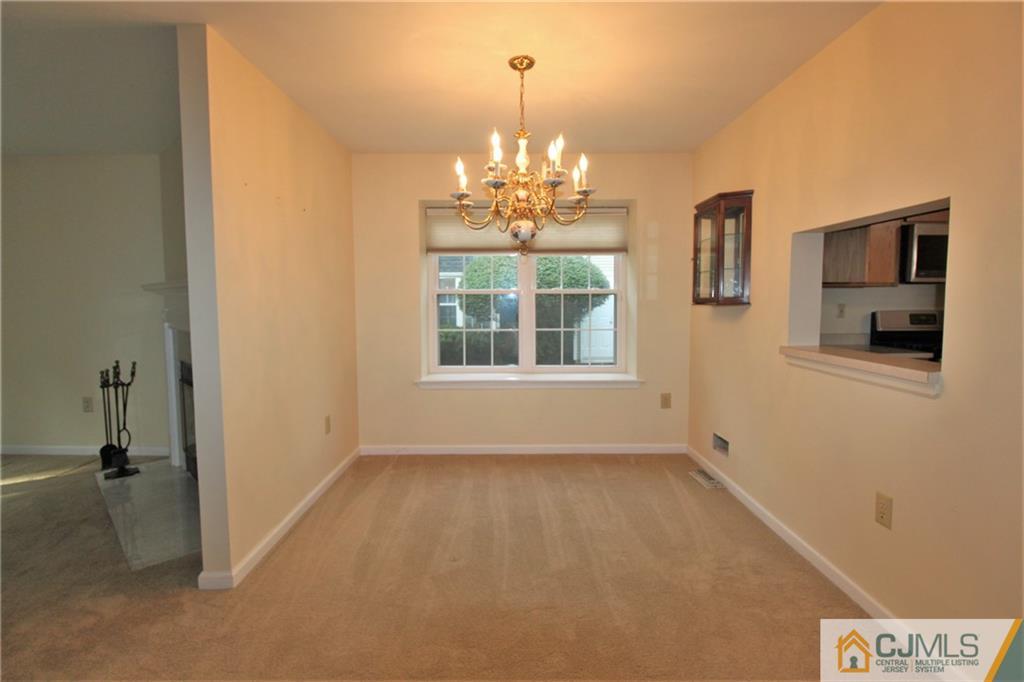 64 Goodwin Drive North Brunswick, NJ 08902 - Photo 8 of 25 a view of a room with a window