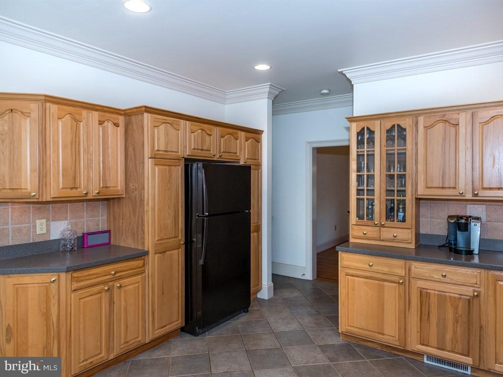 785 Rohen Ridge Drive Lititz, PA 17543 - Photo 15 of 36 a kitchen with stainless steel appliances granite countertop a refrigerator and cabinets