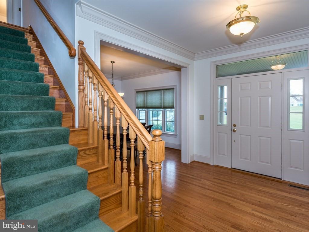785 Rohen Ridge Drive Lititz, PA 17543 - Photo 3 of 36 a view of entryway and hall with wooden floor