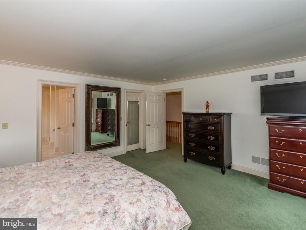 785 Rohen Ridge Drive Lititz, PA 17543 - Photo 21 of 36 a bedroom with a bed and furniture