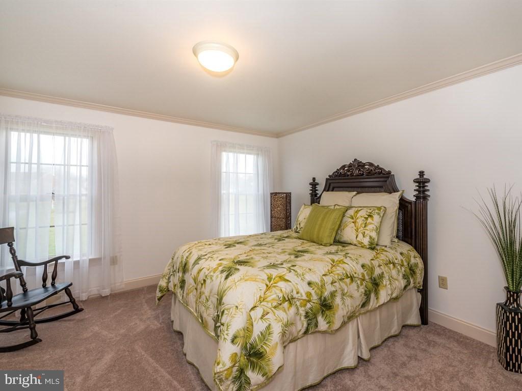 785 Rohen Ridge Drive Lititz, PA 17543 - Photo 25 of 36 a bedroom with a bed and large windows