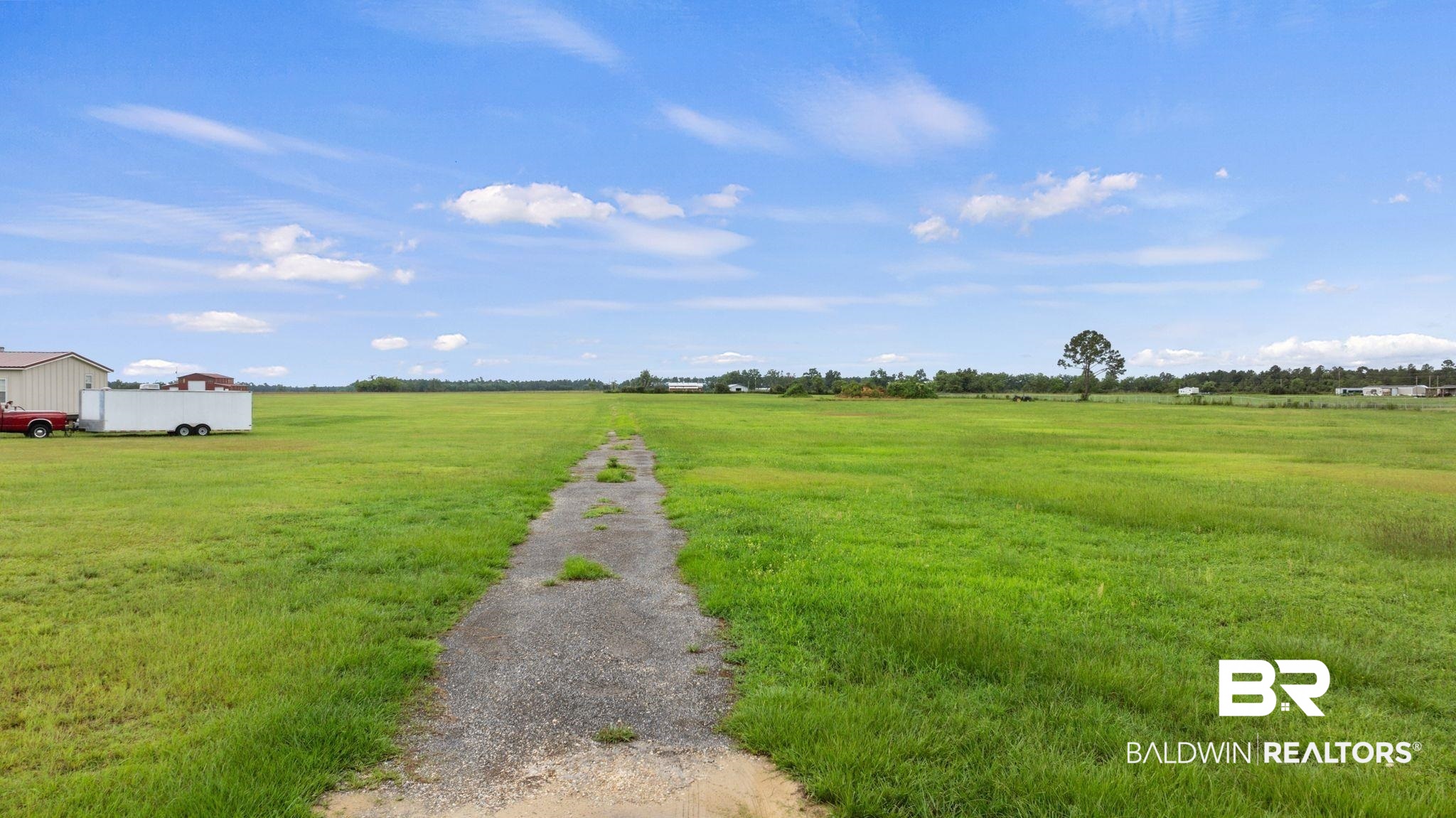 26242 County Road 32 Elberta, AL 36530 - Photo 2 of 7 View of dirt / gravel road featuring a rural view