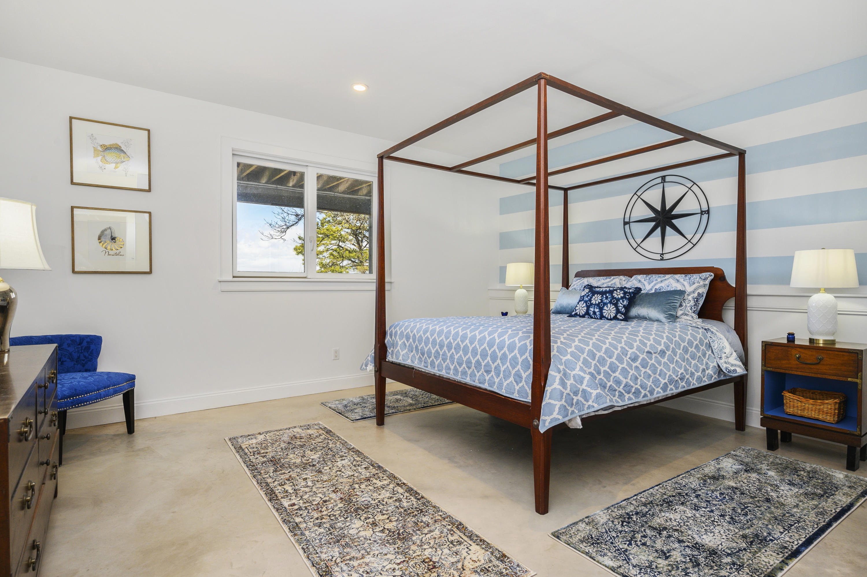 20 Partridge Way Wellfleet, MA 02667 - Photo 35 of 43 a bedroom with a bed and wooden floor