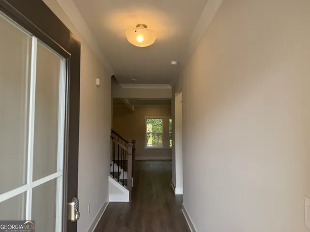 a view of a livingroom from a hallway