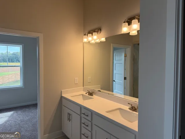 a view of a house with swimming pool and a yard