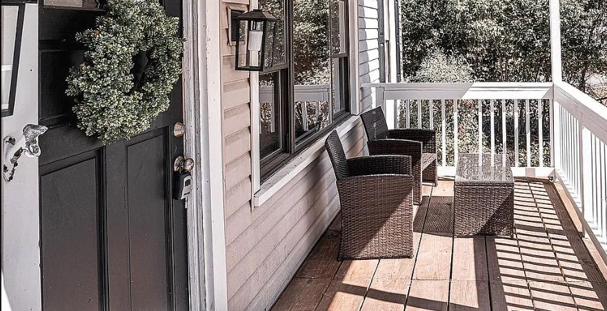 3305 Cherokee Avenue Columbus, GA 31906 - Photo 5 of 50 a balcony view with a large window and wooden floor
