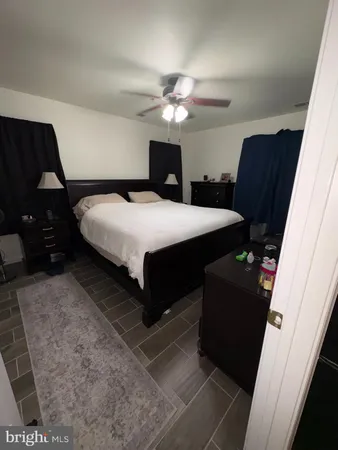 a bedroom with a bed and a closet