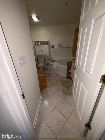 a bathroom with a sink and toilet