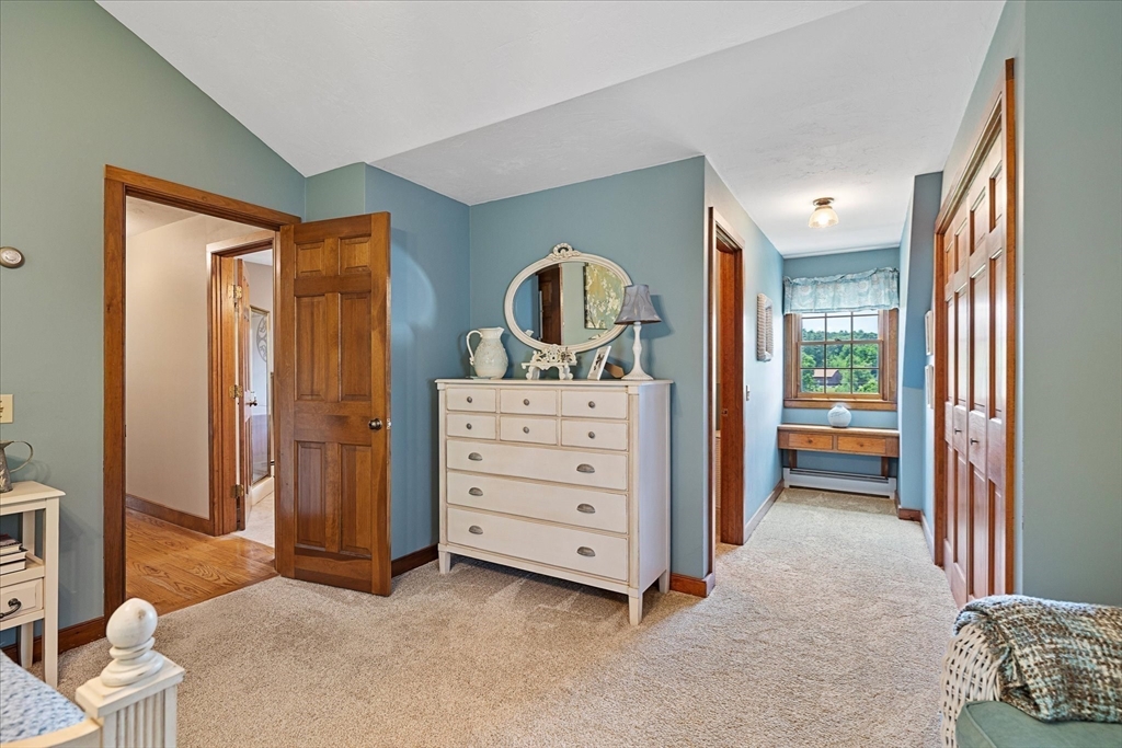 58 Rice Corner Road Brookfield, MA 01506 - Photo 20 of 41 a room with furniture and a dresser