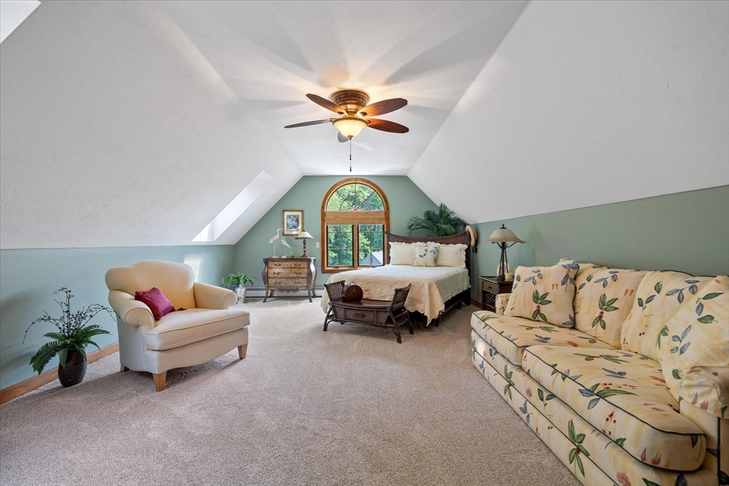 58 Rice Corner Road Brookfield, MA 01506 - Photo 28 of 41 a living room with furniture flowerpot and a chandelier