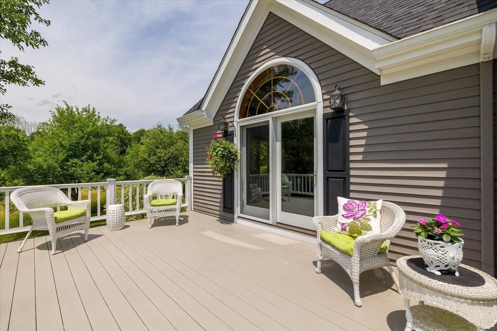 58 Rice Corner Road Brookfield, MA 01506 - Photo 34 of 41 a view of house with deck and seating space