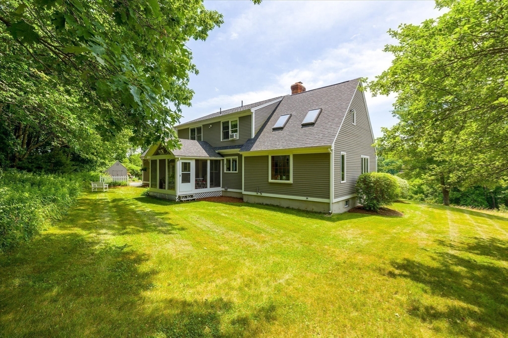 58 Rice Corner Road Brookfield, MA 01506 - Photo 37 of 41 a front view of a house with a yard