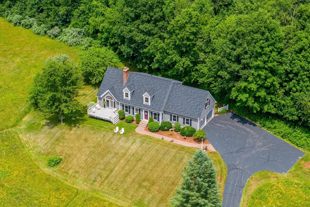 58 Rice Corner Road Brookfield, MA 01506 - Photo 4 of 41 an aerial view of a house with a garden