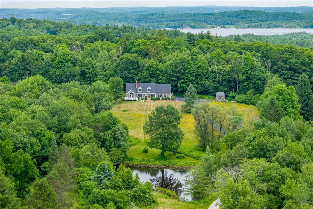 58 Rice Corner Road Brookfield, MA 01506 - Photo 5 of 41 a view of a lake with a mountain view