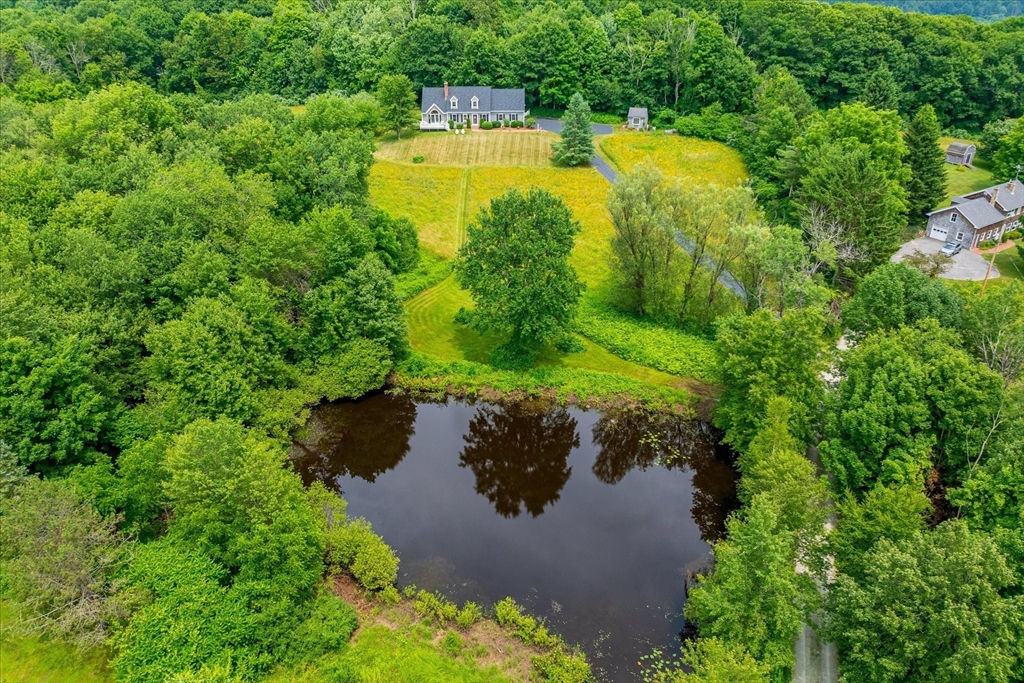 58 Rice Corner Road Brookfield, MA 01506 - Photo 6 of 41 an aerial view of a house with a yard
